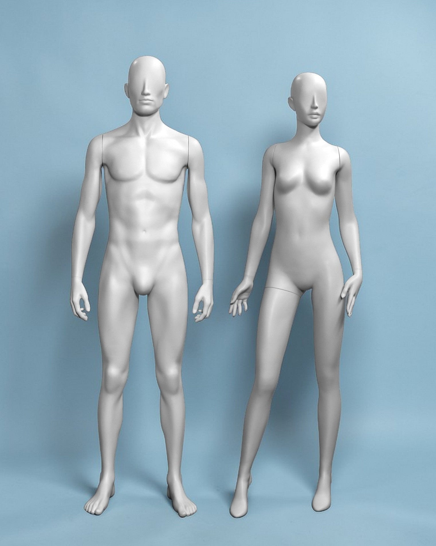 White male and female mannequins on a light blue background